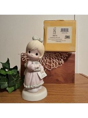 Precious Moments “Confirmed in the Lord" figurine